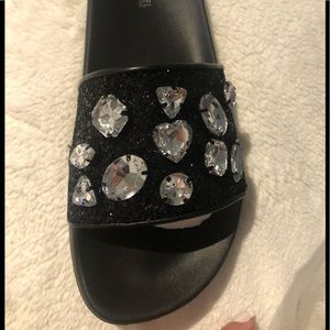 From MICHAEL Michael Kors, the Gilmore Jewel Embellished Glitter Slides